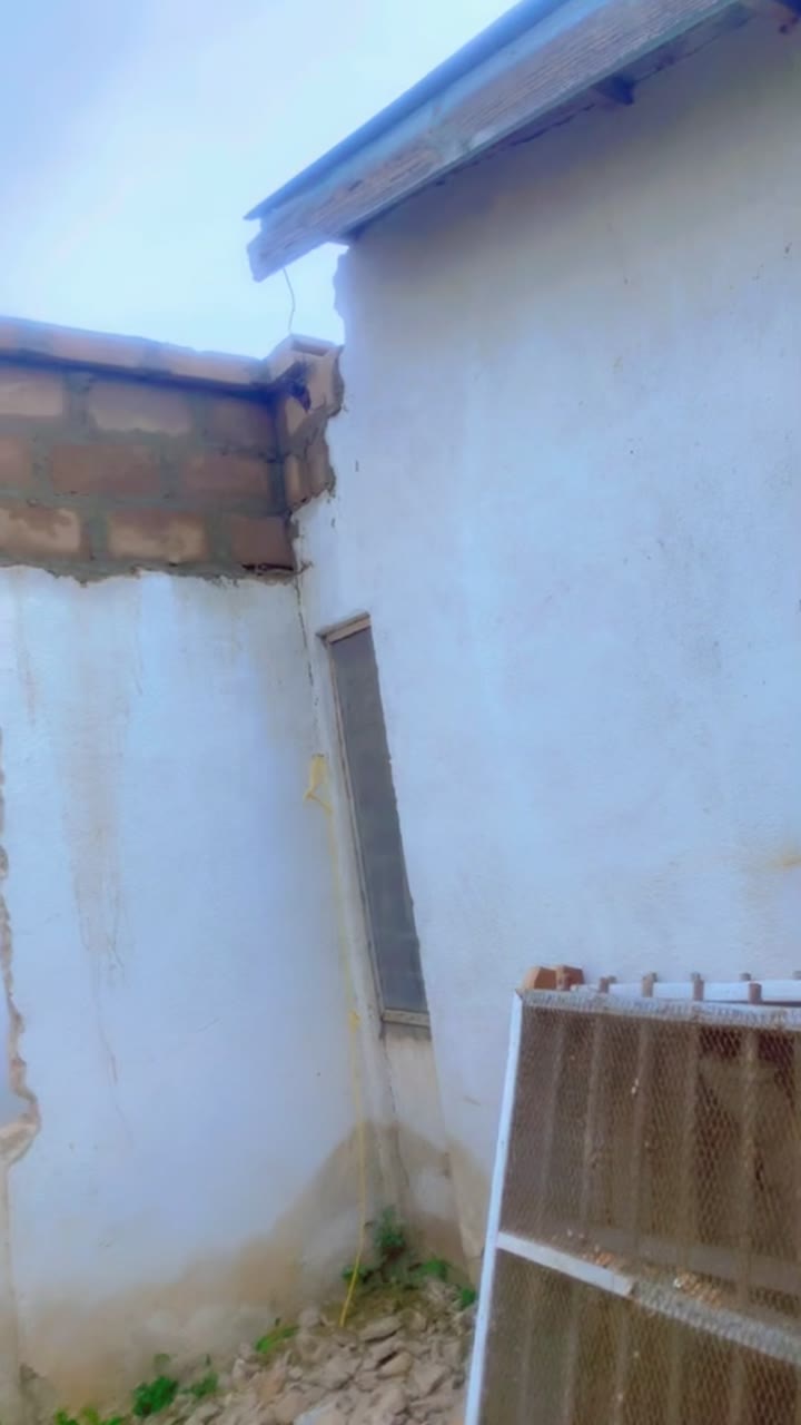 The Mikocheni B residence during transformation, with new blockwork being raised