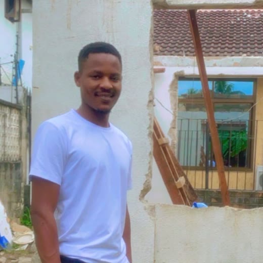 Emmanuel Mwita, HROK co-founder, on site during the Mikocheni B transformation