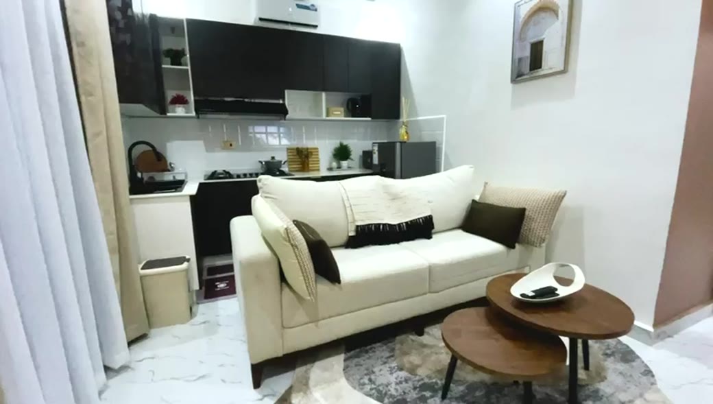 A furnished, completed apartment living room in the optimised Mikocheni B residence